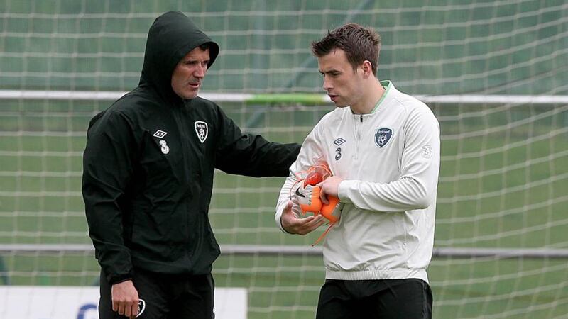 Republic of Ireland assistant manager Roy Keane with Séamus Coleman at Gannon Park, Malahide. Photograph:  Donall Farmer / Inpho