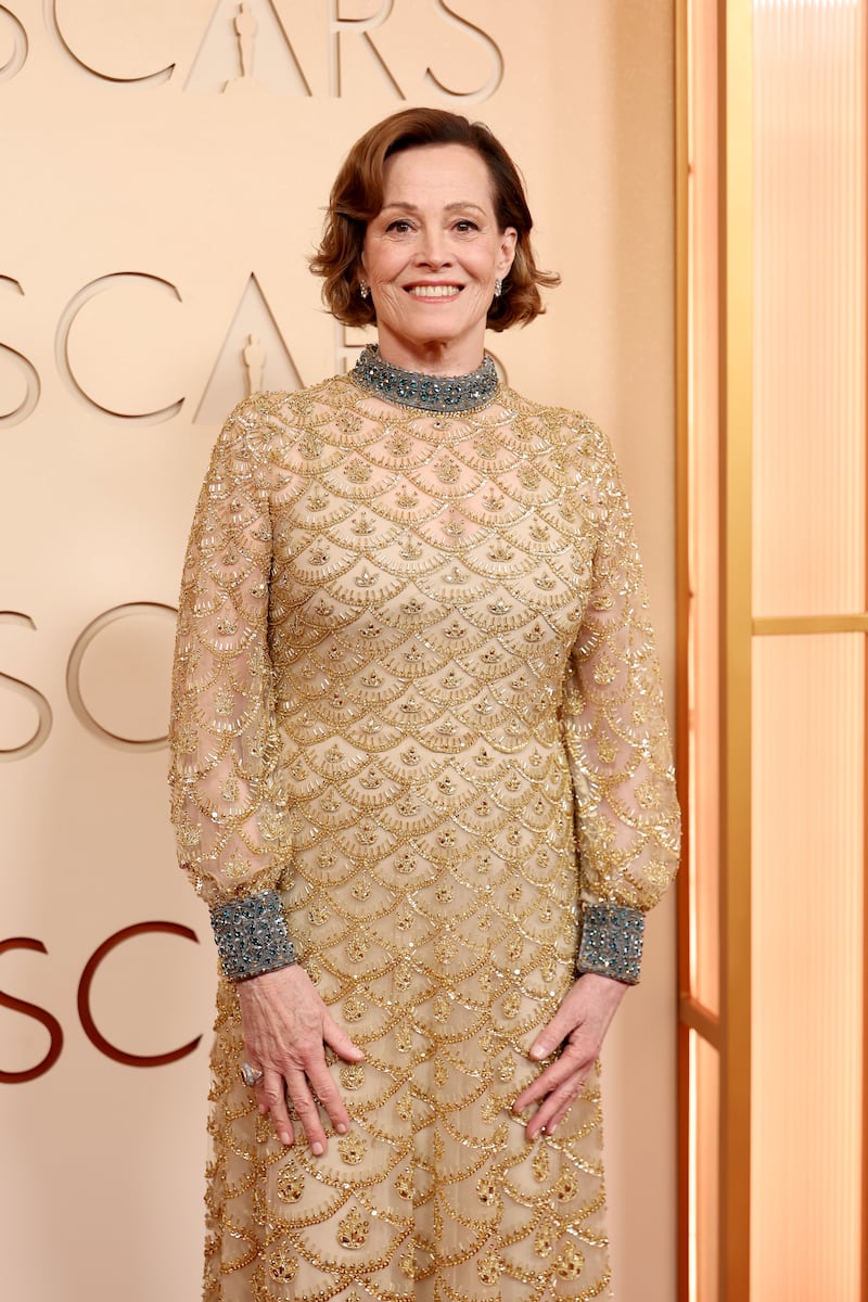 Avatar 3 star Sigourney Weaver in gold sequins. Photograph: Arturo Holmes/Getty Images