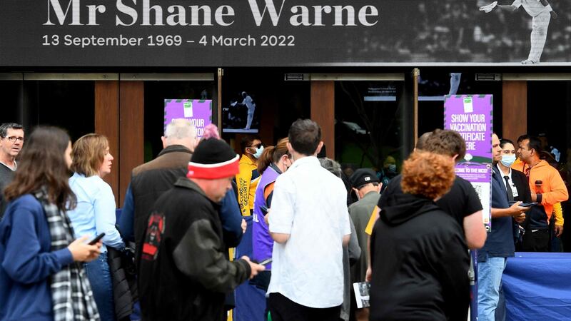 Members of the public wait to enter the Melbourne Cricket Ground for the state memorial service of former Australian cricketer Shane Warne. Photograph: Getty Images