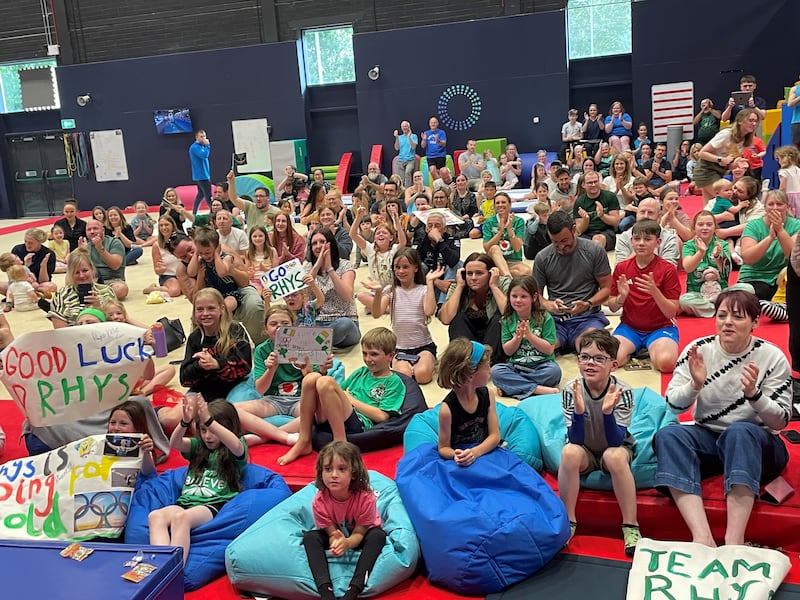 Supporters at Origin Gymnastics in Newtownards cheer on Rhys McClenaghan during the men's pommel horse final at the Paris Olympics. Photograph: Rebecca Black/PA