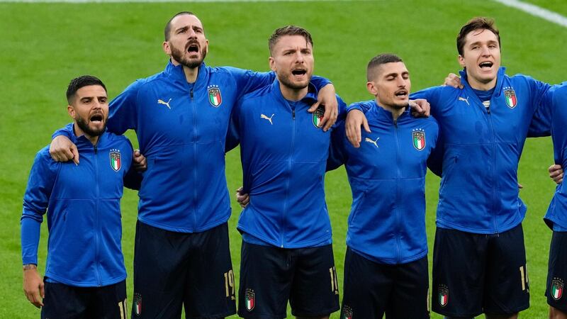 Italy players sing their anthem ahead of the semi-final with Spain. Photograph: Matt Dunham/AP