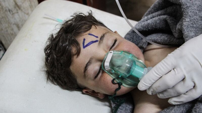 A child receives treatment at a field hospital in Saraqib, Idlib province,  on Tuesday after an apparent chemical weapons attack that is being blamed on the Syrian government. Photograph:  EPA