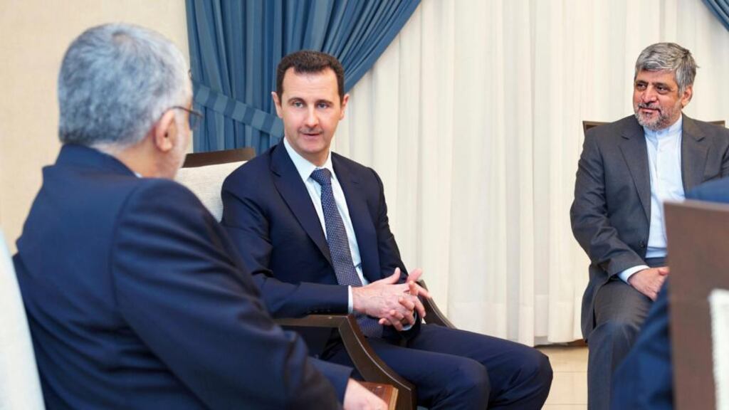 Syrian president Bashar al-Assad (centre) meets Alaeddin Boroujerdi (left), head of the Iranian parliamentary committee for national security and foreign policy, in Damascus yesterday. Photograph: Reuters/Sana