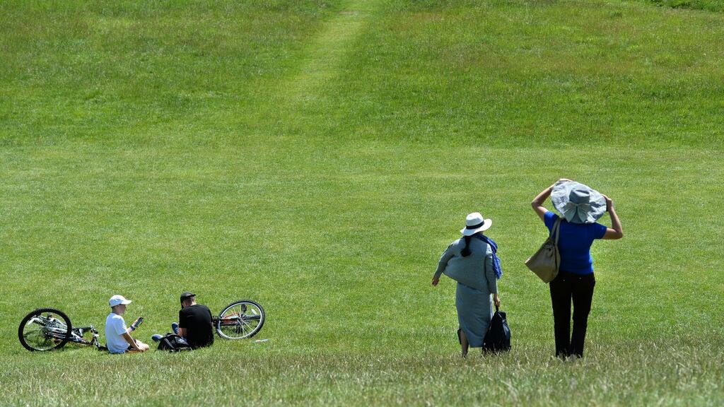 Visitors enjoy the fine weather in the Phoenix Park in Dublin. Photograph: Dara Mac Dónaill / The Irish Times