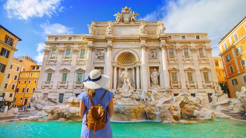 Make a wish at the Trevi Fountain in Rome