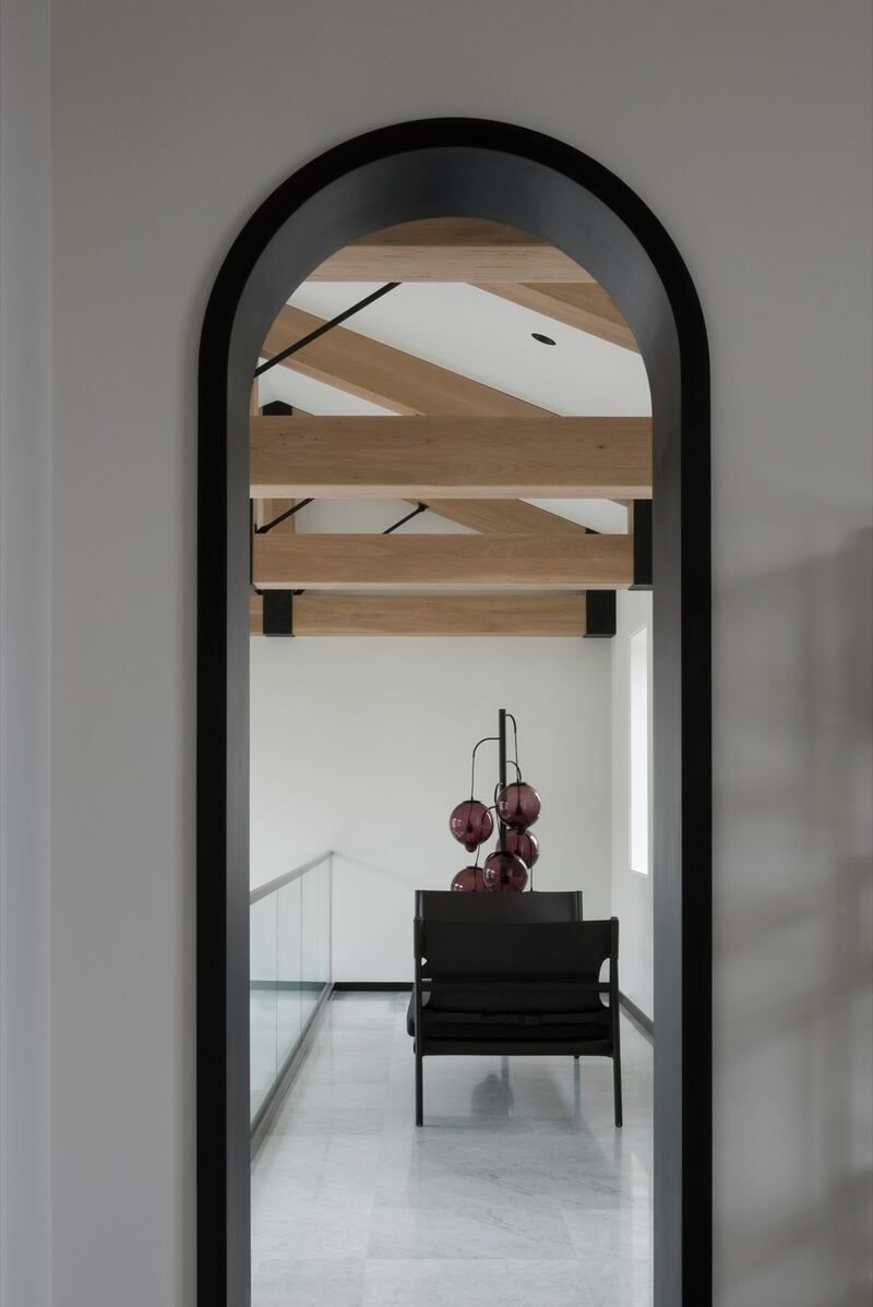 VSHD Design  used a-frame oak beams with blackened steel capping to great effect in  The Ranch, in Orlando.