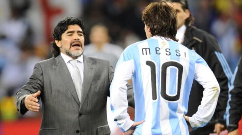 As manager of the Argentina team in 2010, Diego Maradona embraces Lionel Messi after they lose the World Cup quarter-final to Germany. File photograph: Getty Images