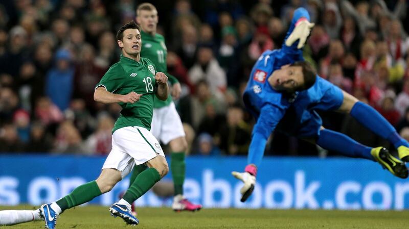 Hoolahan scores his first Ireland goal against Poland in 2013. Photo: James Crombie/Inpho