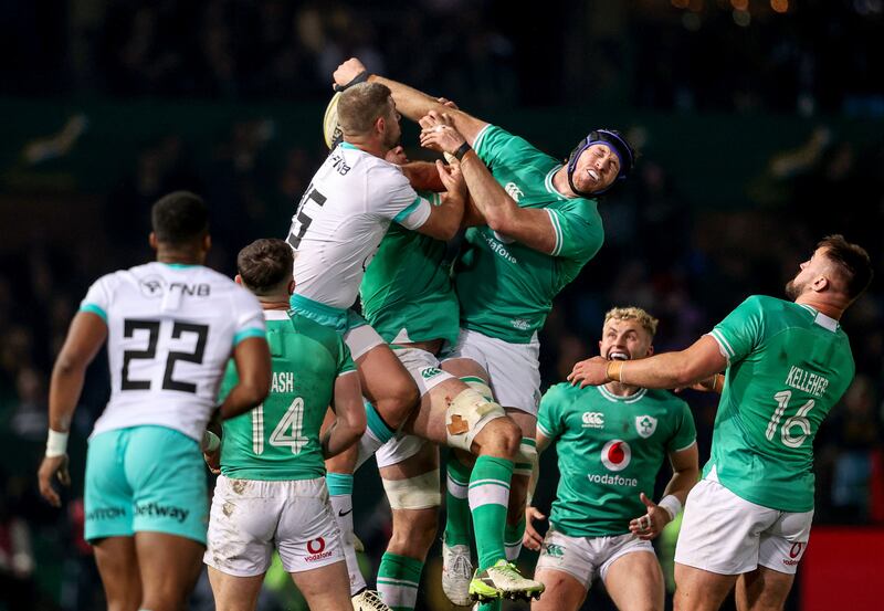 Ireland's Ryan Baird with South Africa's Jamie Osborne. Photograph:  Dan Sheridan/Inpho