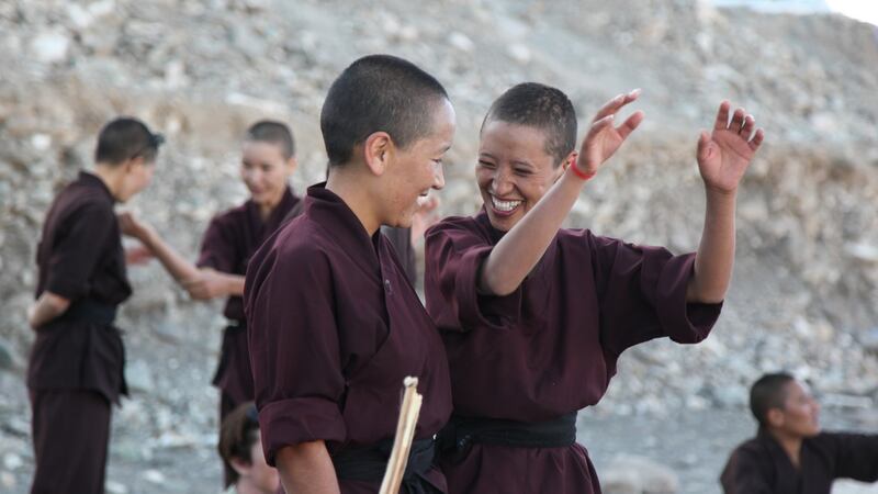 Buddhist nuns share a joke during a self-defence workshop in India’s remote Himalayan region of Ladakh.  Photograph: Nita Bhalla/Thomson Reuters Foundation