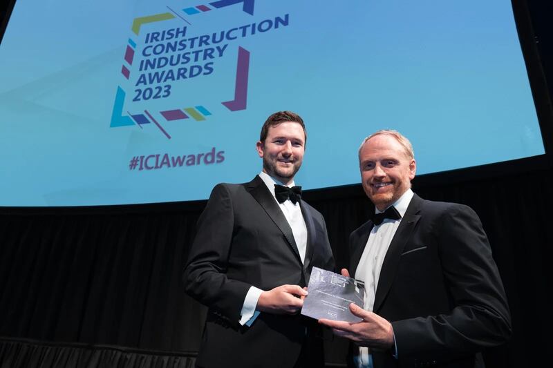 Dan Kilpatrick, ROI sales manager of Automatics and Access Control, KCC Group, presents the innovation in construction award to Mark Wiggins, Jones Engineering