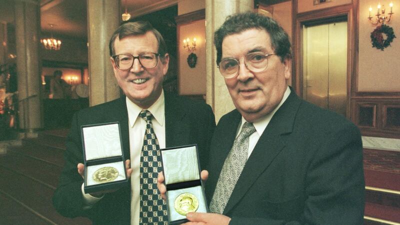 Nobel Peace Prize winners David Trimble and John Hume display the Alfred Nobel medals in Oslo City Hall in 1998.  Photograph: Matt Kavanagh