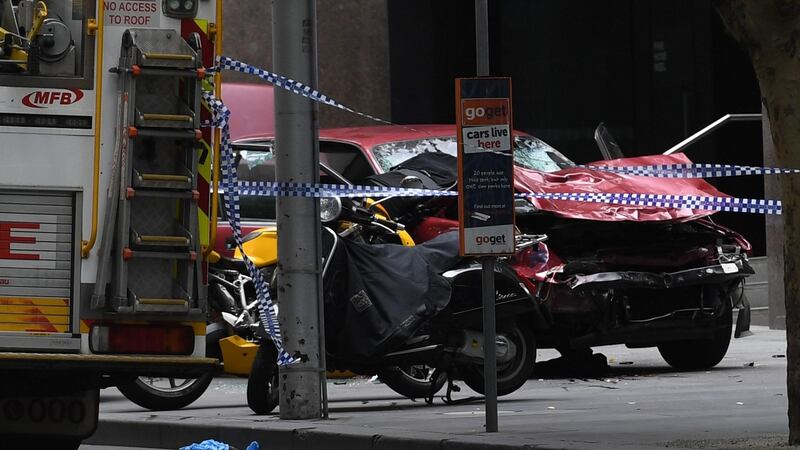 Police and emergency services at the scene where a man went on a rampage in a car through busy area in Melbourne. Photograph: Julian Smith/ EPA