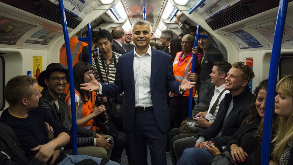 London mayor Sadiq Khan stands on the city’s first night tube train on Saturday, part of a new 24-hour service on the London Underground. Photograph: Jack Taylor/Getty Images