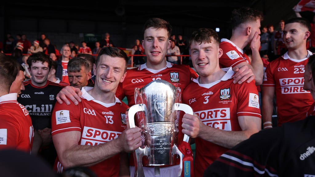 Cork's Patrick Horgan, Robert Downey and Eoin Downey celebrate with the Munster title in 2025. Photograph: Laszlo Geczo/Inpho