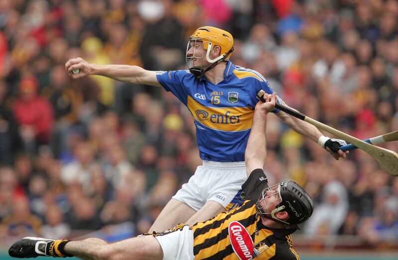 Lar Corbett catches the sliotar ahead of Noel Hickey to score a goal during the All Ireland hurling final in 2010. Photograph: Alan Betson