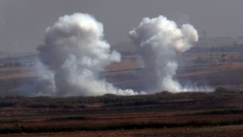 In this photo taken from the Turkish side of the border between Turkey and Syria, in Akcakale, Sanliurfa province, southeastern Turkey, smoke billows from targets inside Syria during bombardment by Turkish forces on Thursday. Photograph:Lefteris Pitarakis/AP