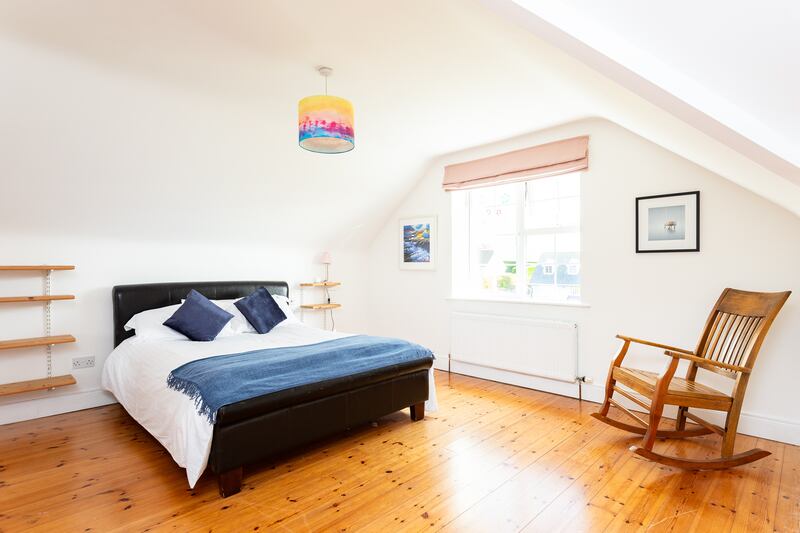One of the four bedrooms on the first floor