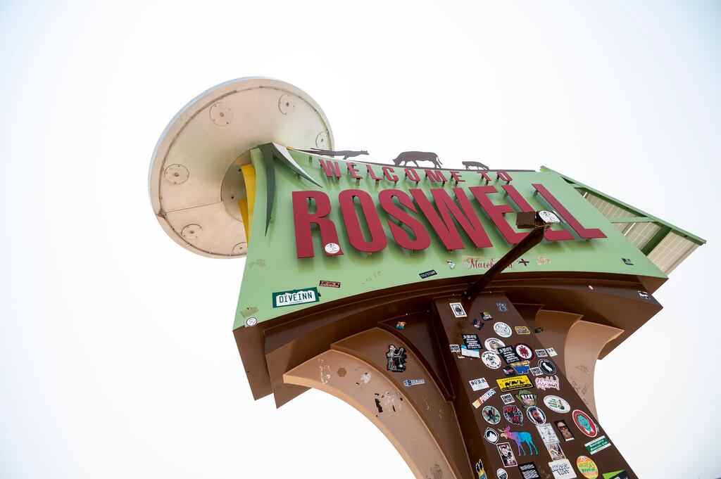 Welcome to Roswell: the location has the best town entrance sign in all of the US, which is the introduction to a three-mile procession of standard neon-lit eats and sleeps places before you reach the historic centre. Photograph: Bill Clark/CQ-Roll Call, Inc/Getty