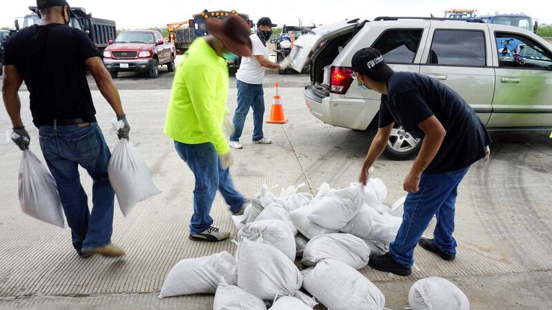 Sandbags are distributed  in Brownsville, Texas as residents prepare for torrential rainfall due to Hurricane Hanna. Photograph: AP