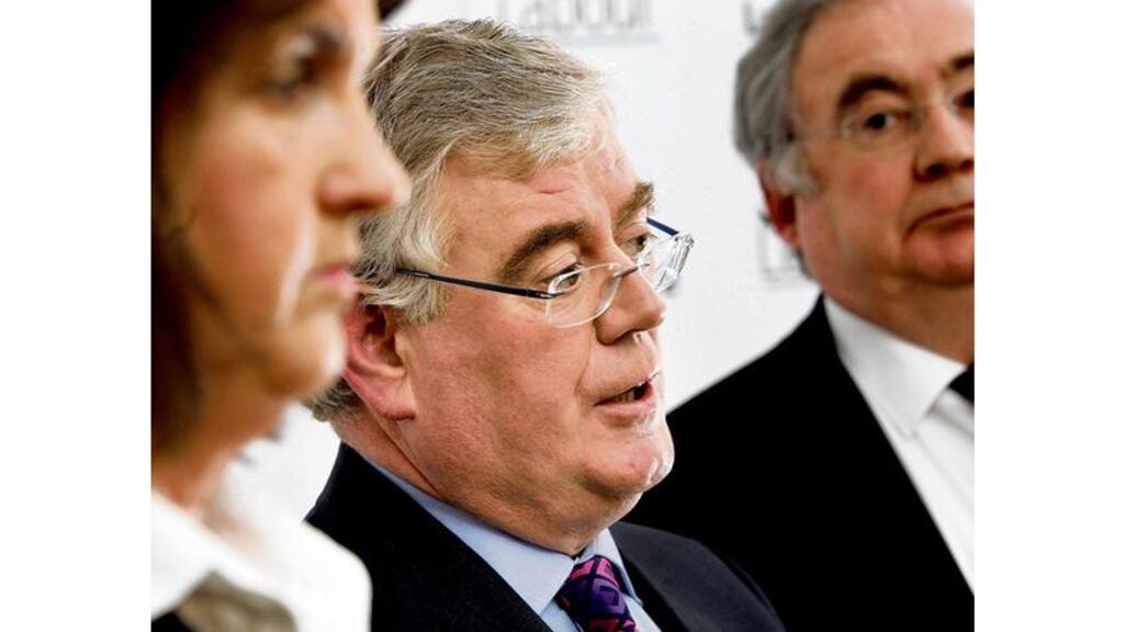 Labour Party leader Eamon Gilmore with deputy leader and finance spokeswoman Joan Burton, and former leader Pat Rabbitte, at the launch of the party's Private Members' Bill, which calls for an inquiry into the banking crisis.