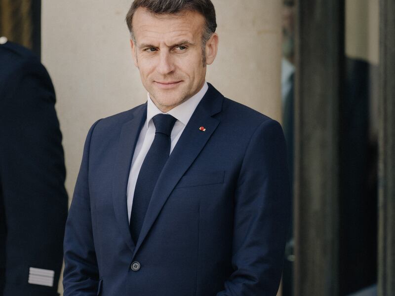Emmanuel Macron President of the French Republic waits before welcoming the German Federal Chancellor before a meeting of allies to consider sending a multinational force to ensure security and the free flow of trade in the Strait of Hormuz at the Elysee Presidential Palace in Paris France o today. Photo  Bastien Ohier / Hans Lucas / AFP via Getty Images