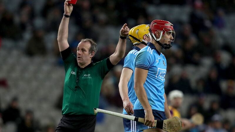 Dublin’s Eoghan O’Donnell is shown a red card during his side’s late defeat to Wexford. Photograph: Bryan Keane/Inpho