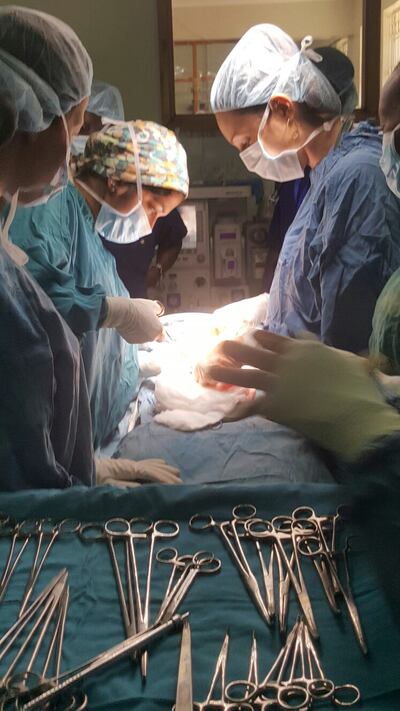 Caitlin Bernard, right, working in Kenya in February 2017