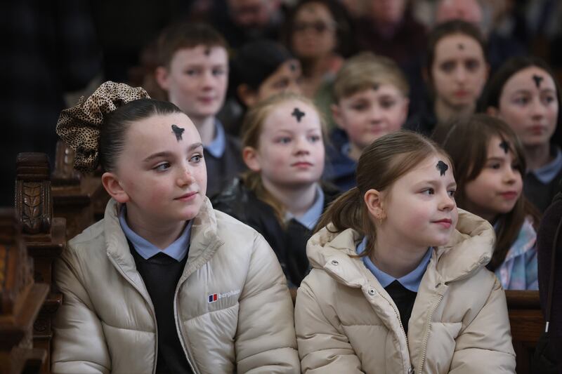 Children from the Central Model School, Marlborough Street Dublin, at St Mary’s Pro Cathedral on Ash Wednesday to mark the first day of Lent. Photograph: Bryan O’Brien 