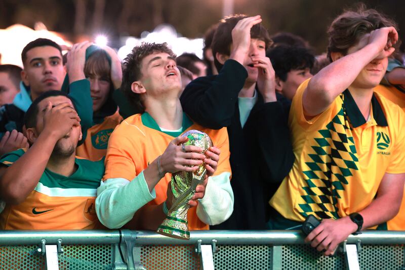 Australian soccer fans in Sydney react with disappointment after their team was eliminated from the World Cup in the round of 32 against Egypt on July 3rd. Photograph: David Gray/AFP via Getty Images