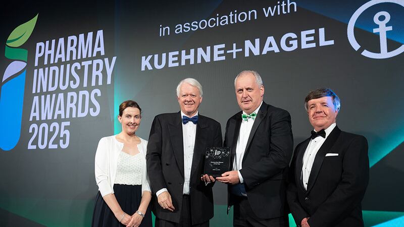 Matt Moran, awards judging coordinator, presents the partnership alliance of the year to the NIBRT and ATU team