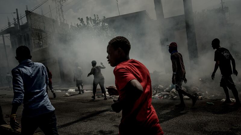 Protesters calling for the resignation of then-president Jovenel Moïse in Port-au-Prince in October 2019. Photograph: Meridith Kohut/The New York Times
