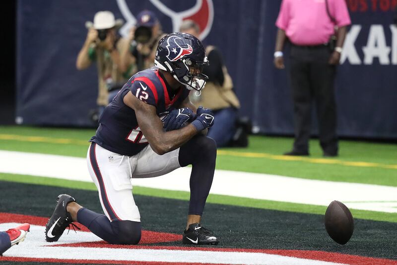 Nico Collins of the Houston Texans after a touchdown earlier this season. Photograph: Bob Levey/Getty Images
