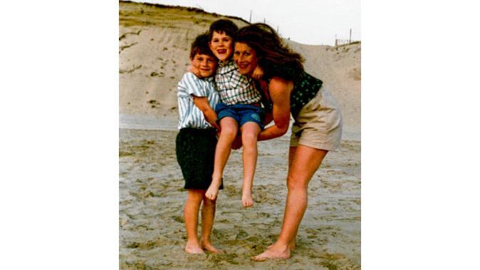 Andrew Freedman with his brother Michael and mother Gillian on a family holiday.