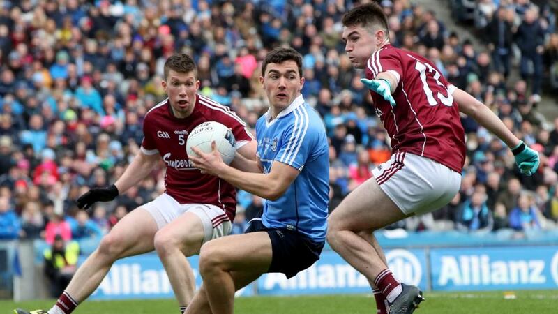 Dublin’s Shane Carthy in action against Gareth Bradshaw and Barry McHugh of Galway during the Allianz Football League Division One Final at Croke Park. Photograph: Bryan Keane/Inpho