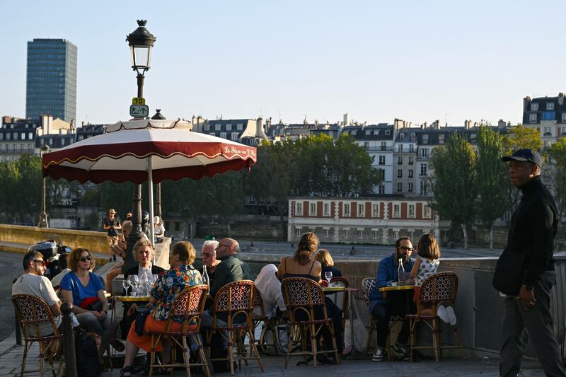 A restaurant terrace in central Paris. Informal gatherings without a big focus on food are increasingly popular in France. Photograph: Miguel Medina/AFP via Getty Images