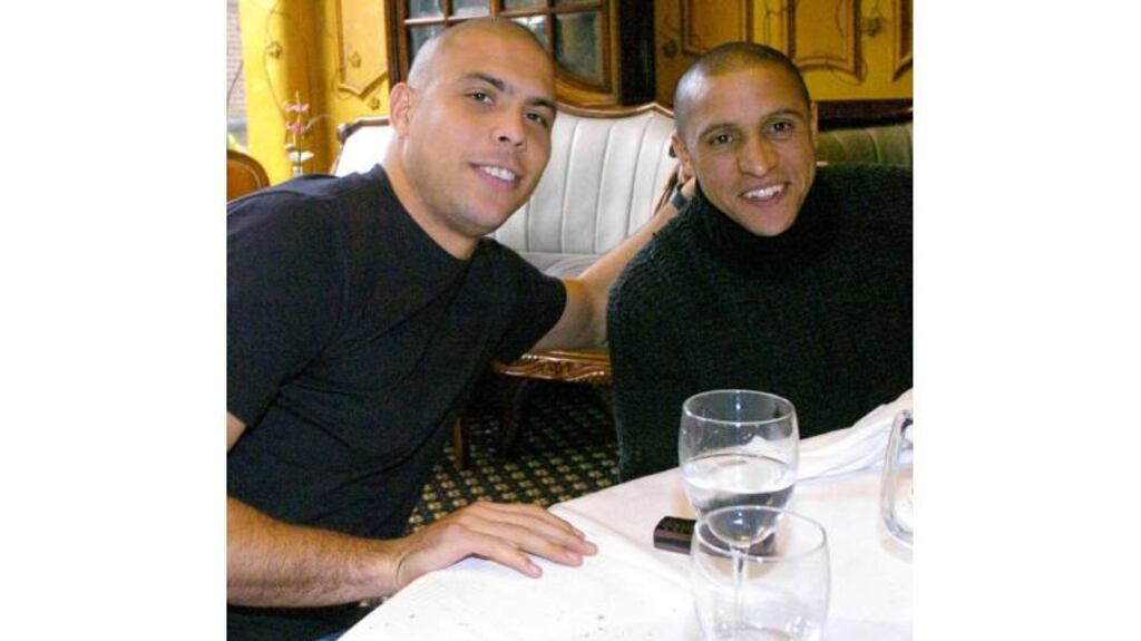 Brazil's Ronaldo (left), and Roberto Carlos relax on their arrival at the Burlington Hotel, Dublin, before their friendly match against the Republic of Ireland at Lansdowne Road tomorrow.