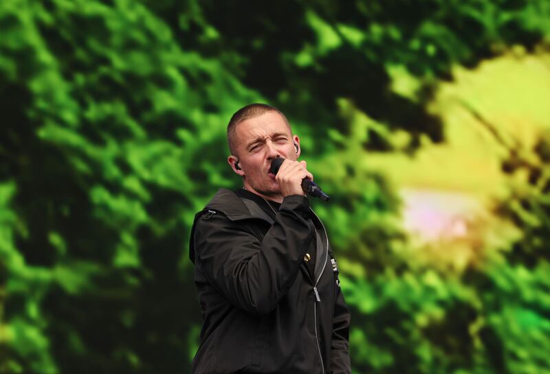 Dermot Kennedy playing with Cranberries band members Noel and Mike Hogan. Photograph: Alan Betson