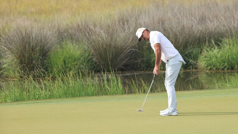 Koepka putts on the 13th green. Photo: Sam Greenwood/Getty Images