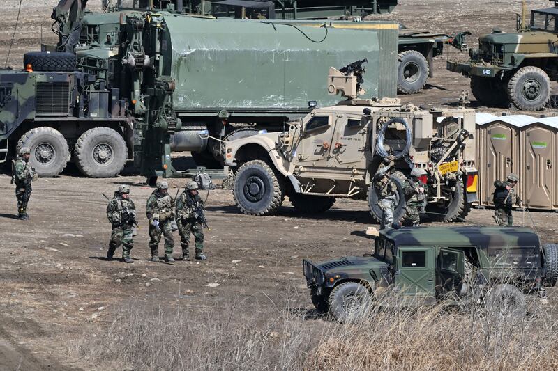 US soldiers walk past military vehicles at a military training field in the border city of Yeoncheon, South Korea on Monday. Photograph: Jung Yeon-Je/AFP via Getty