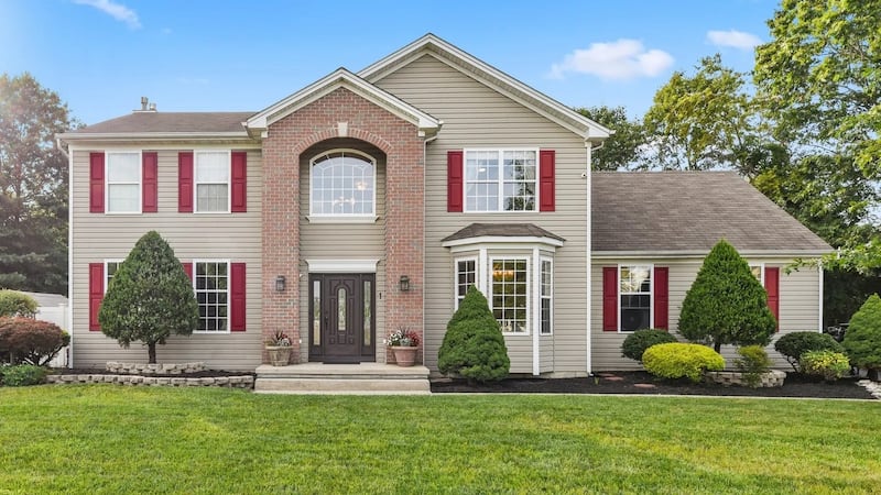 This New Jersey colonial-style home lies  on over an acre