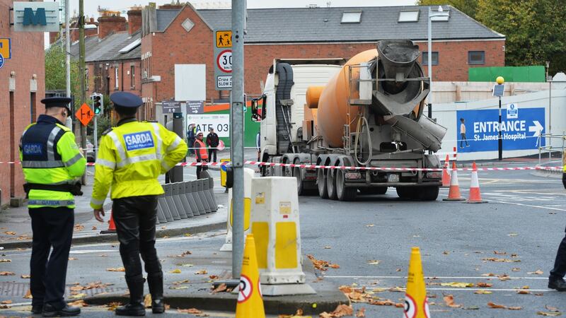 The scene of a fatal collision between a cement mixer truck and a cyclist just outside the rear entrance to St James Hospital and the construction of the National Children’s Hospital. Photograph: Alan Betson/The Irish Times