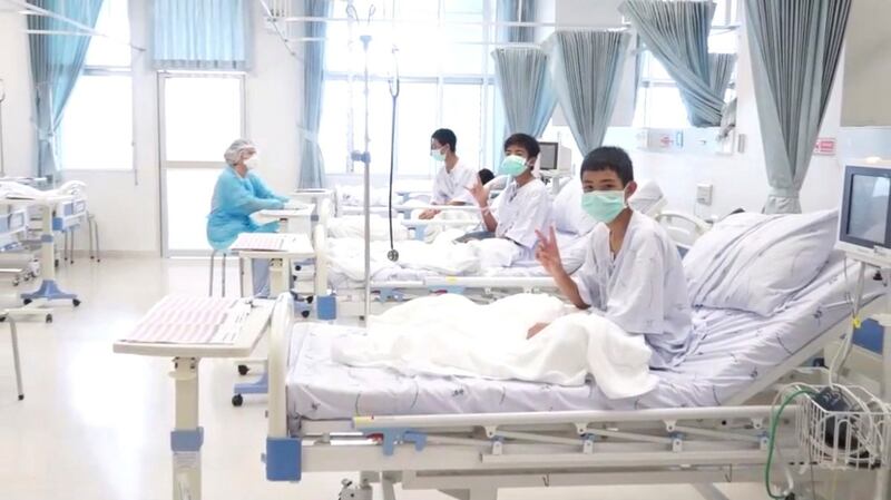 Screen grab shows boys rescued from the Thai cave wearing mask. Photograph: Government Spokesman Bureau/Handout via Reuters
