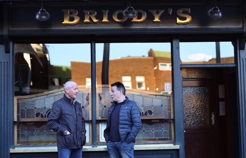 One more thing ... Before they parted, Bernard Flynn wanted to mention a precious and unexpected show of support from Eamonn Heery. Photograph: Dara Mac Dónaill








