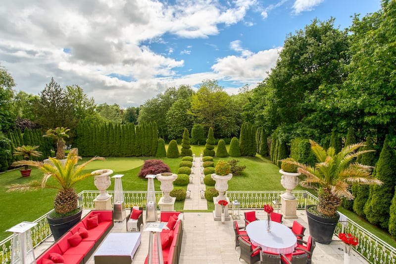Terrace to back of house overlooking immaculate gardens