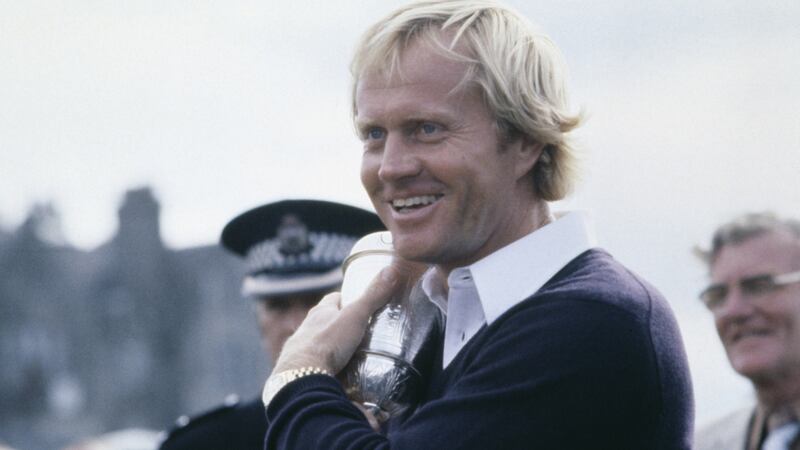 American golfer Jack Nicklaus cuddles the trophy after winning the British Open at St Andrews in 1978 Photograph:  Bob Thomas Sports Photography via Getty