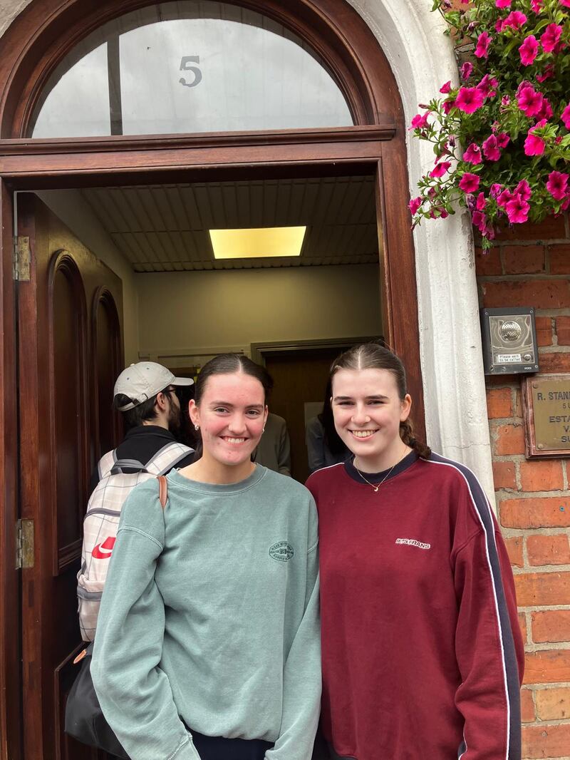 Dubliner Nora Burke (left), a student at Queen’s University Belfast, with Cara McGinn, her classmate from Co Tyrone. Photo: Seanín Graham