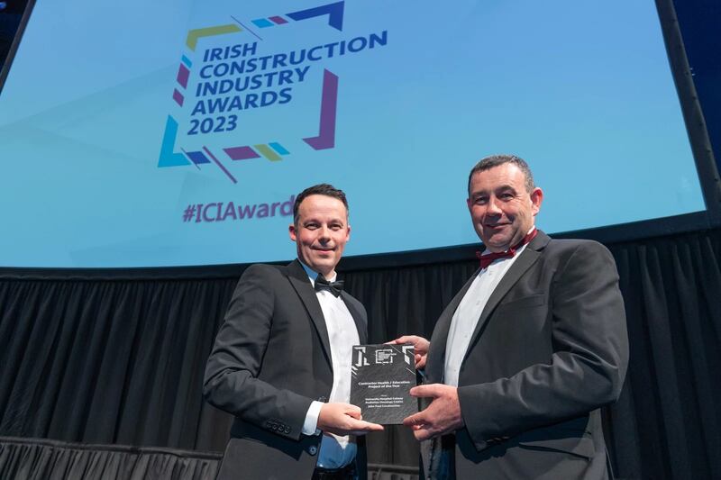 Paul Byrne, sales director at Tech Refrigeration, presents the contractor health/education project of the year award to John Moran, John Paul Construction
