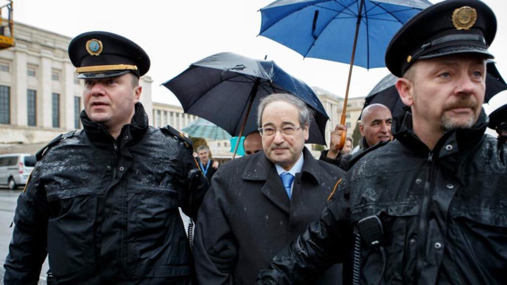 Syrian deputy foreign minister Faisal Mekdad is flanked by police officers after the second round of talks between Syrian government and opposition at UN HQ in Geneva. Photograph: Salvatore di Nolfi/EPA