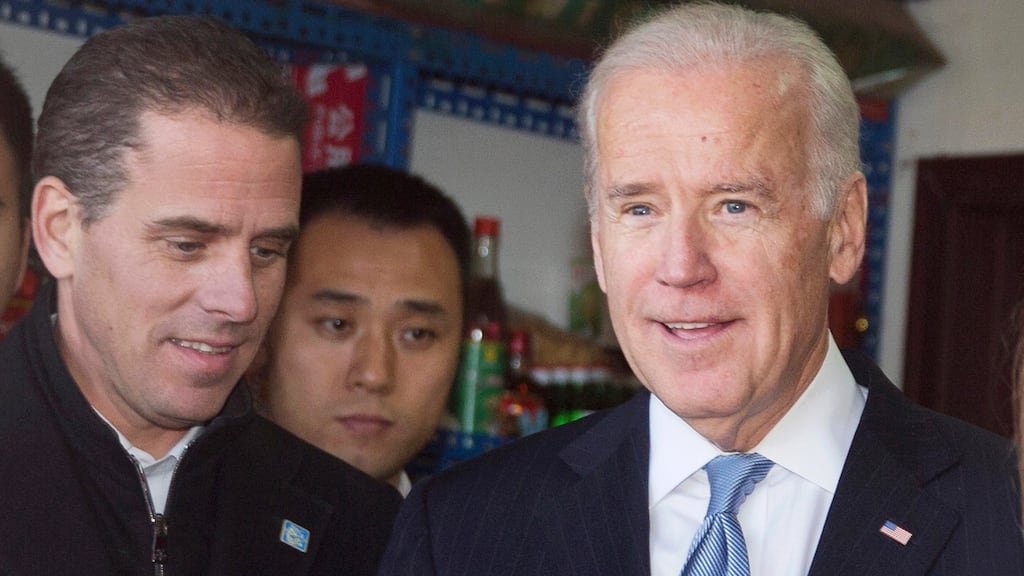 Then US vice-president Joe Biden with his son Hunter in Beijing in  December 2013. Photograph: Andy Wong/EPA